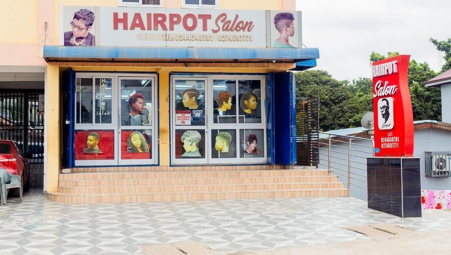Hairpot Salon storefront exterior with signage and entrance steps