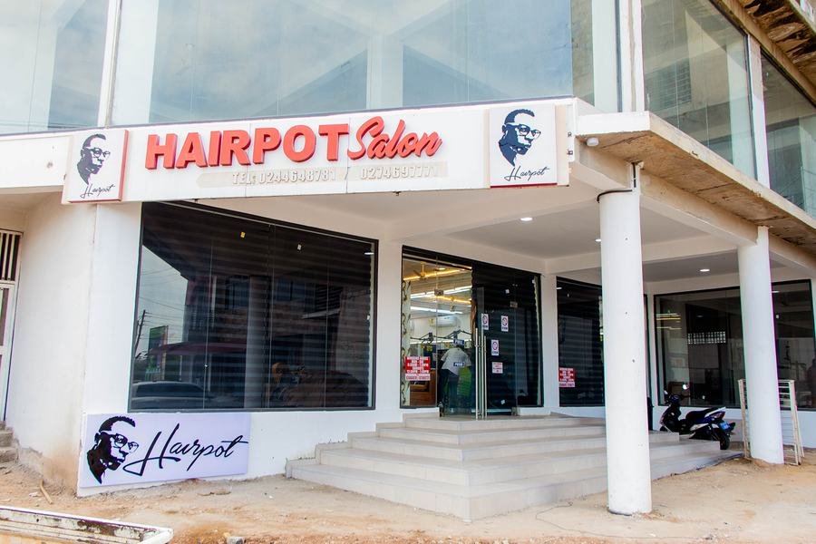 Exterior of a newly built Hairpot Salon branch, finishing touches underway