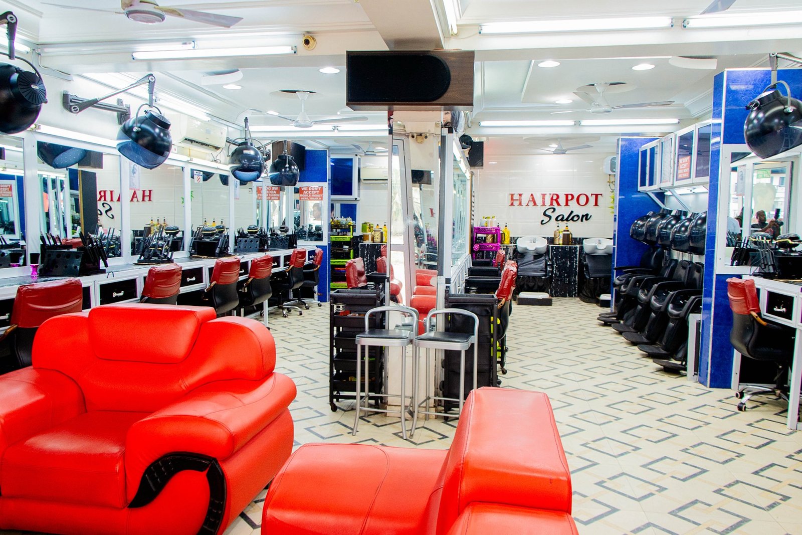Styling stations and seating at a Hairpot Salon branch
